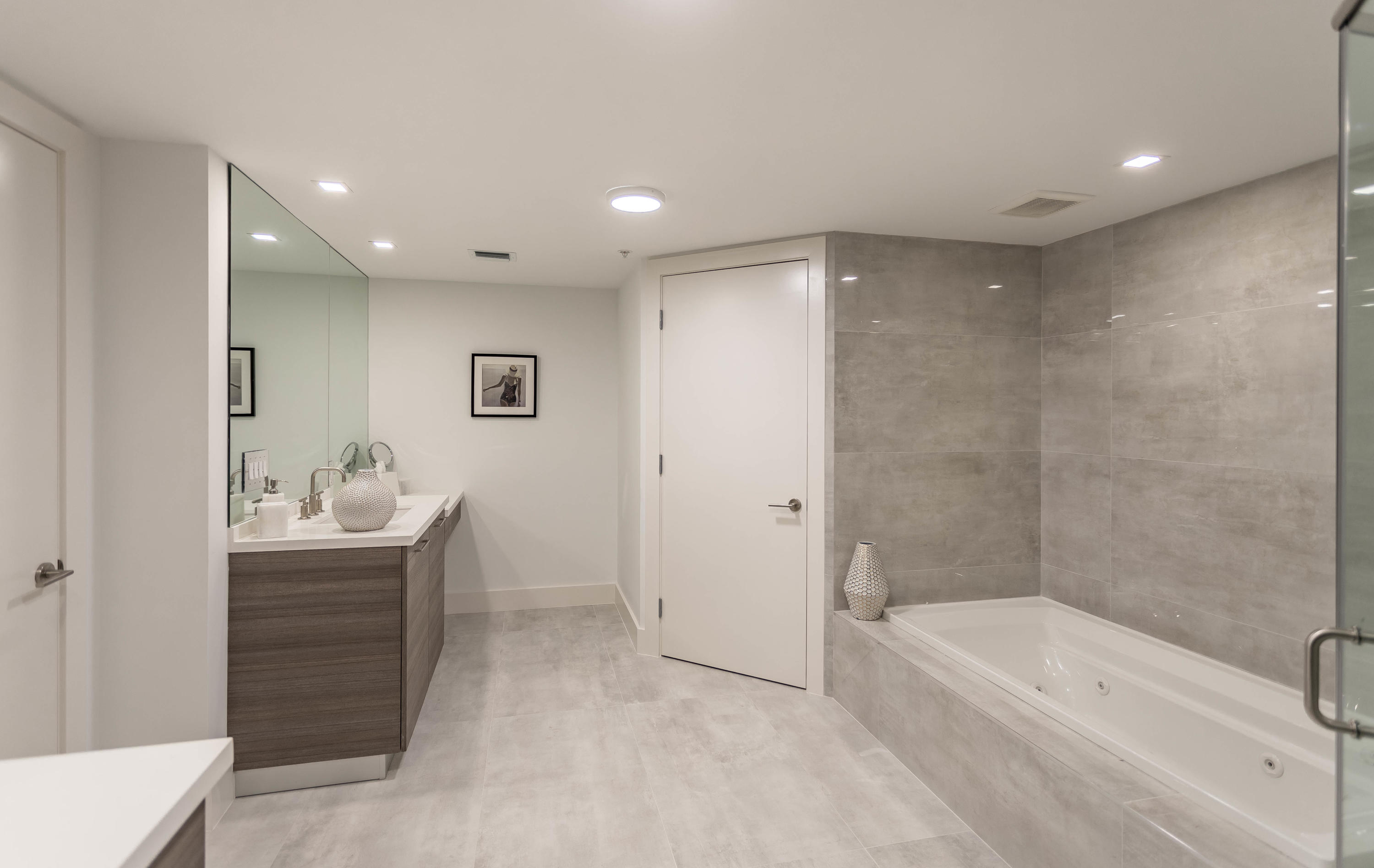 327 East Royal Palm Road, Unit 203 Boca Raton, FL 33432 - Photo 28 of 46 a bathroom with a bathtub and a sink