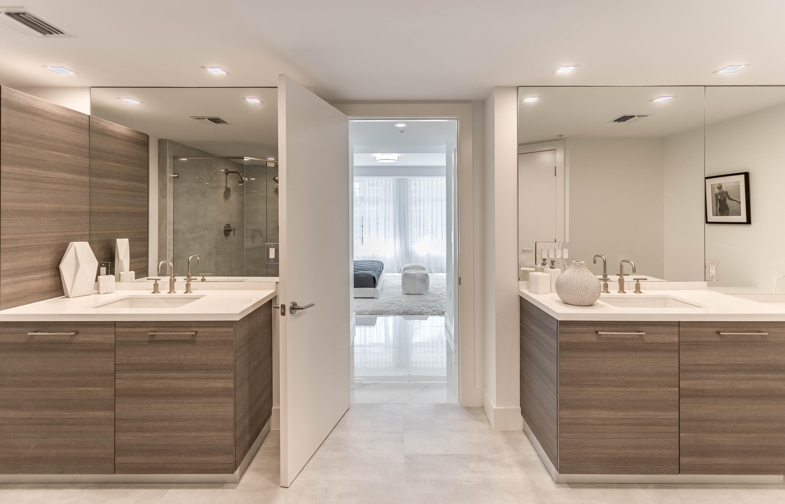 327 East Royal Palm Road, Unit 203 Boca Raton, FL 33432 - Photo 29 of 46 a bathroom with a sink and a mirror