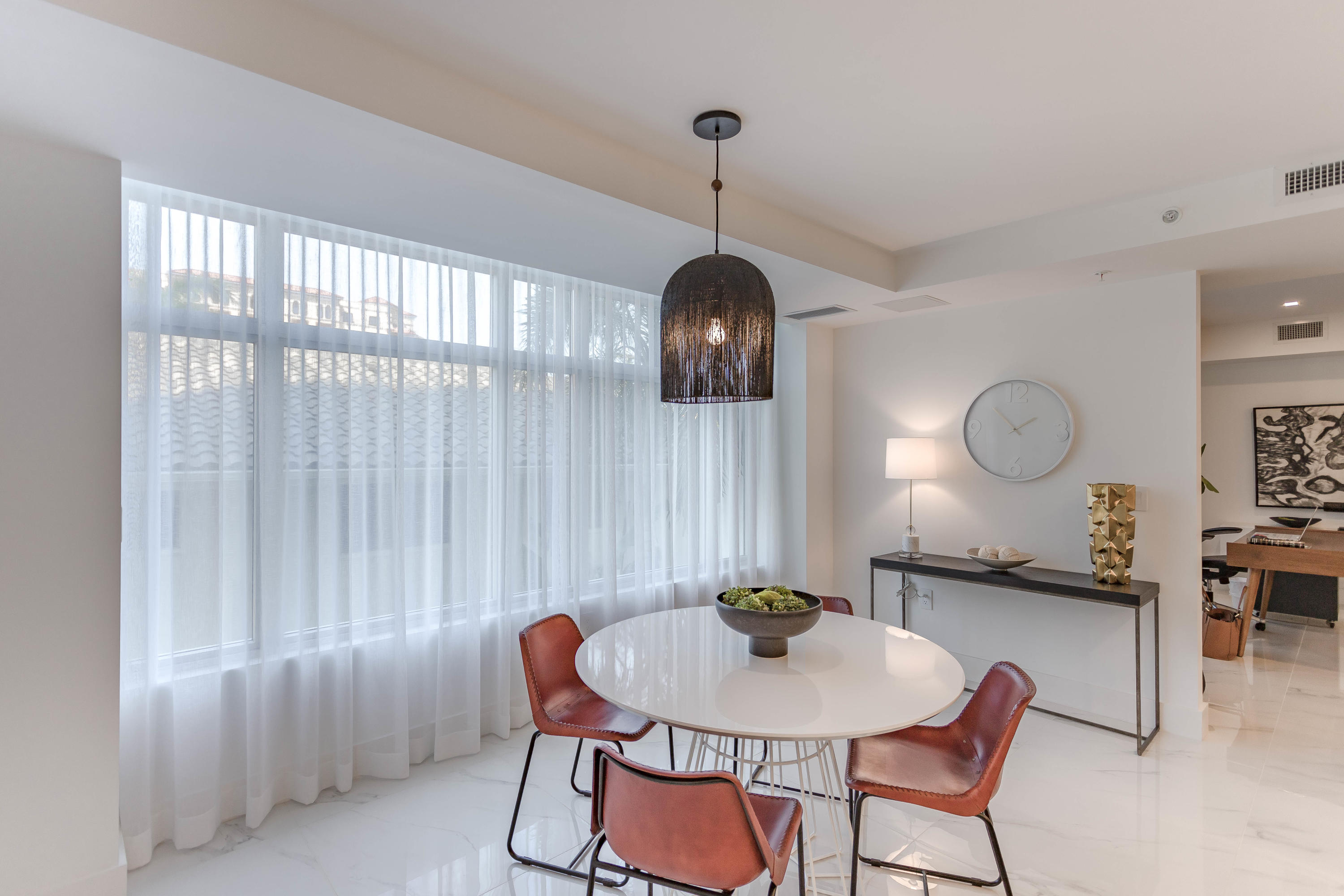 327 East Royal Palm Road, Unit 203 Boca Raton, FL 33432 - Photo 31 of 46 a view of a dining room with furniture window and wooden floor