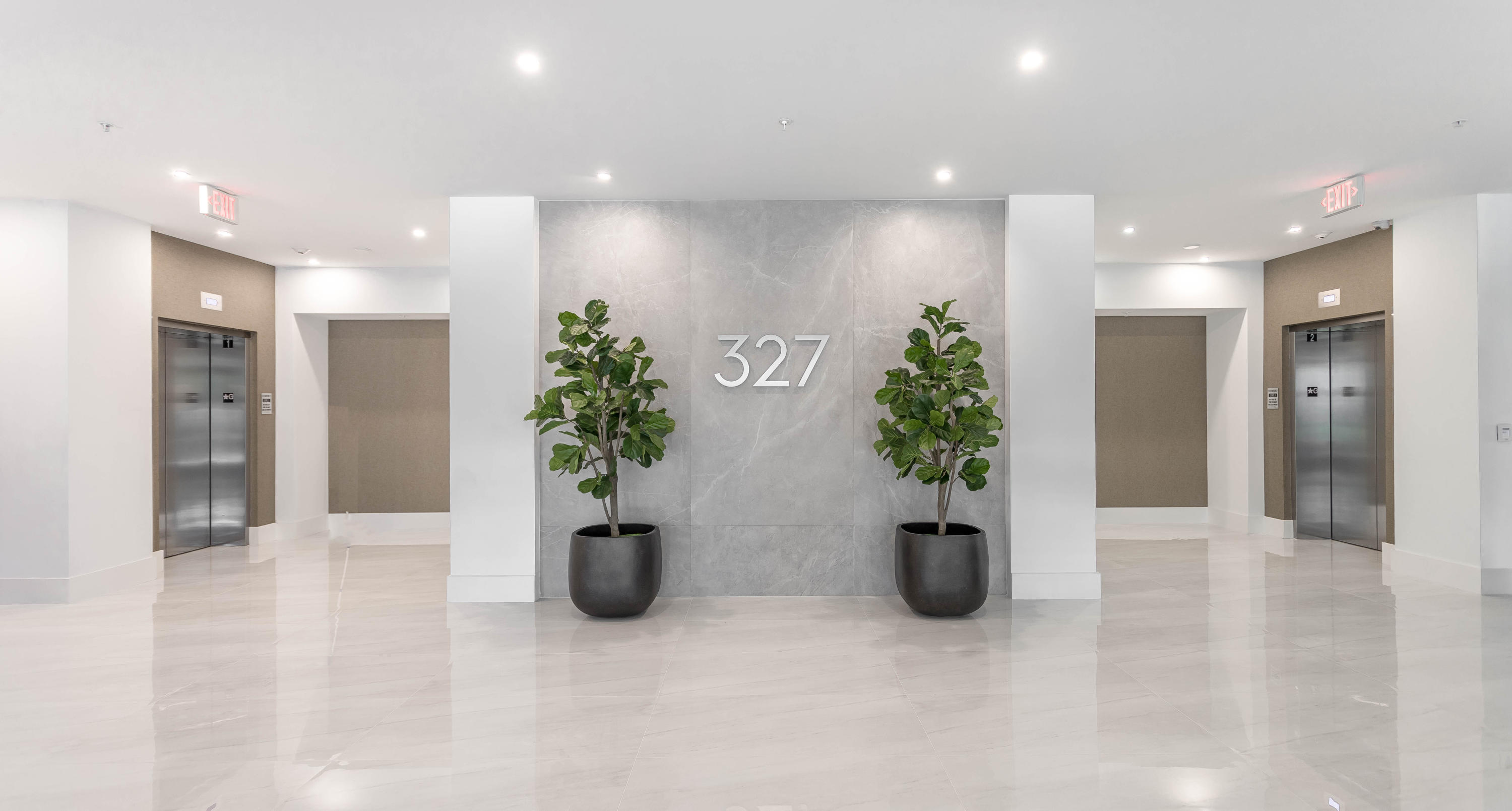 327 East Royal Palm Road, Unit 203 Boca Raton, FL 33432 - Photo 38 of 46 a view of a hallway with potted plant