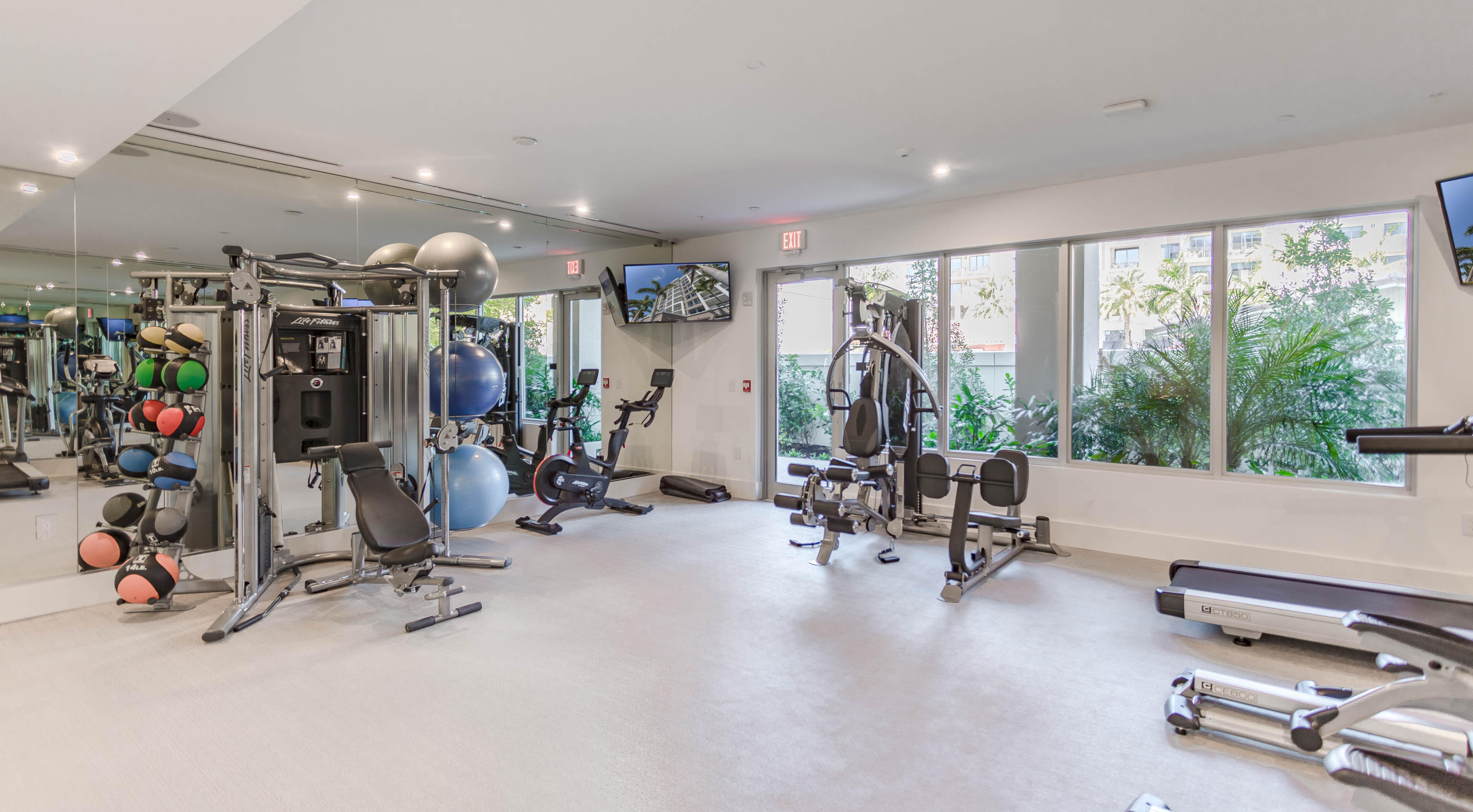 327 East Royal Palm Road, Unit 203 Boca Raton, FL 33432 - Photo 42 of 46 a view of a room with gym equipment
