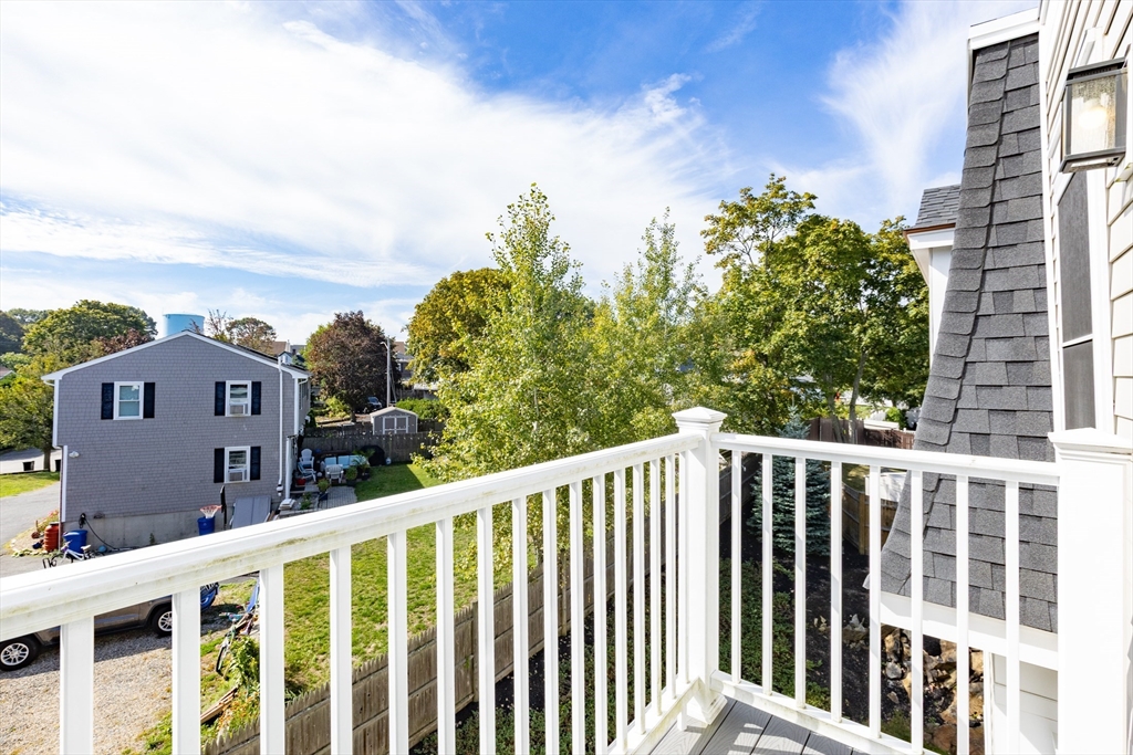 445 Essex Street, Unit 304 Swampscott, MA 01907 - Photo 18 of 35 a view of a houses from balcony
