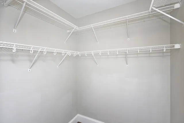 a view of a room with racks on the wall