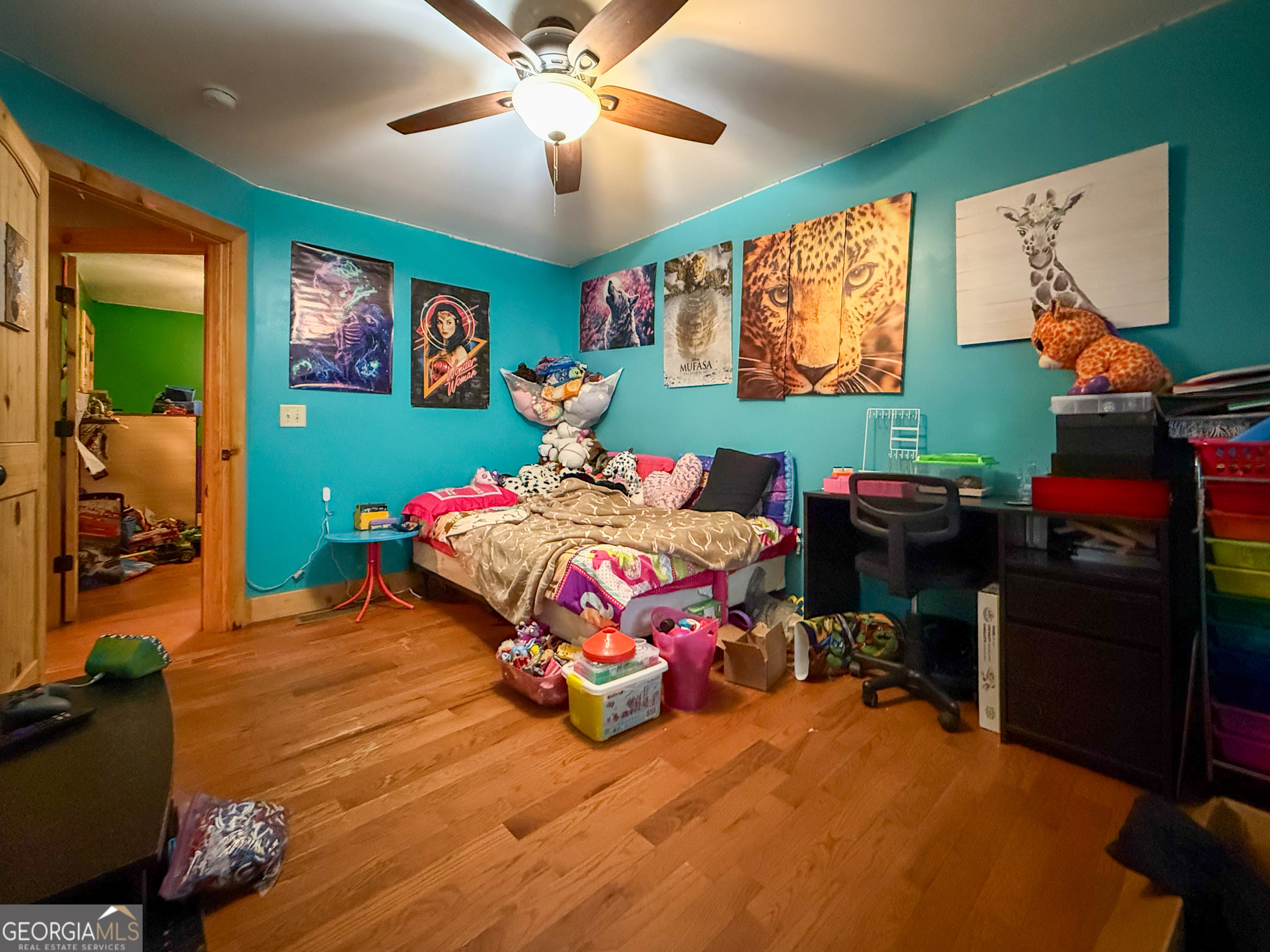 161 Twisting Ridge Trail Demorest, GA 30535 - Photo 13 of 33 a bedroom with a bed and wooden floor