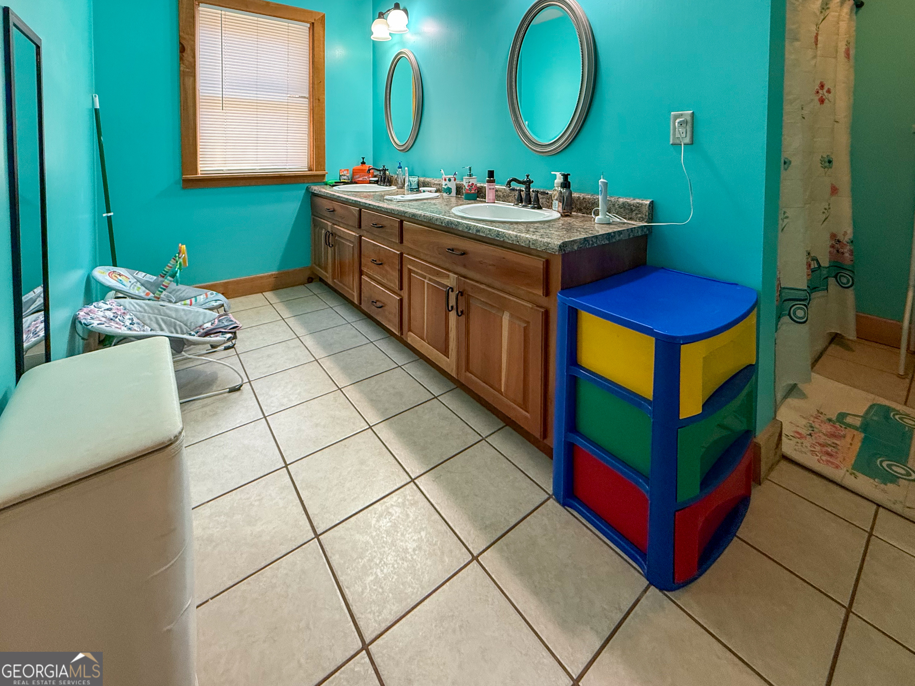 161 Twisting Ridge Trail Demorest, GA 30535 - Photo 19 of 33 a bathroom with a double vanity sink mirror and toilet