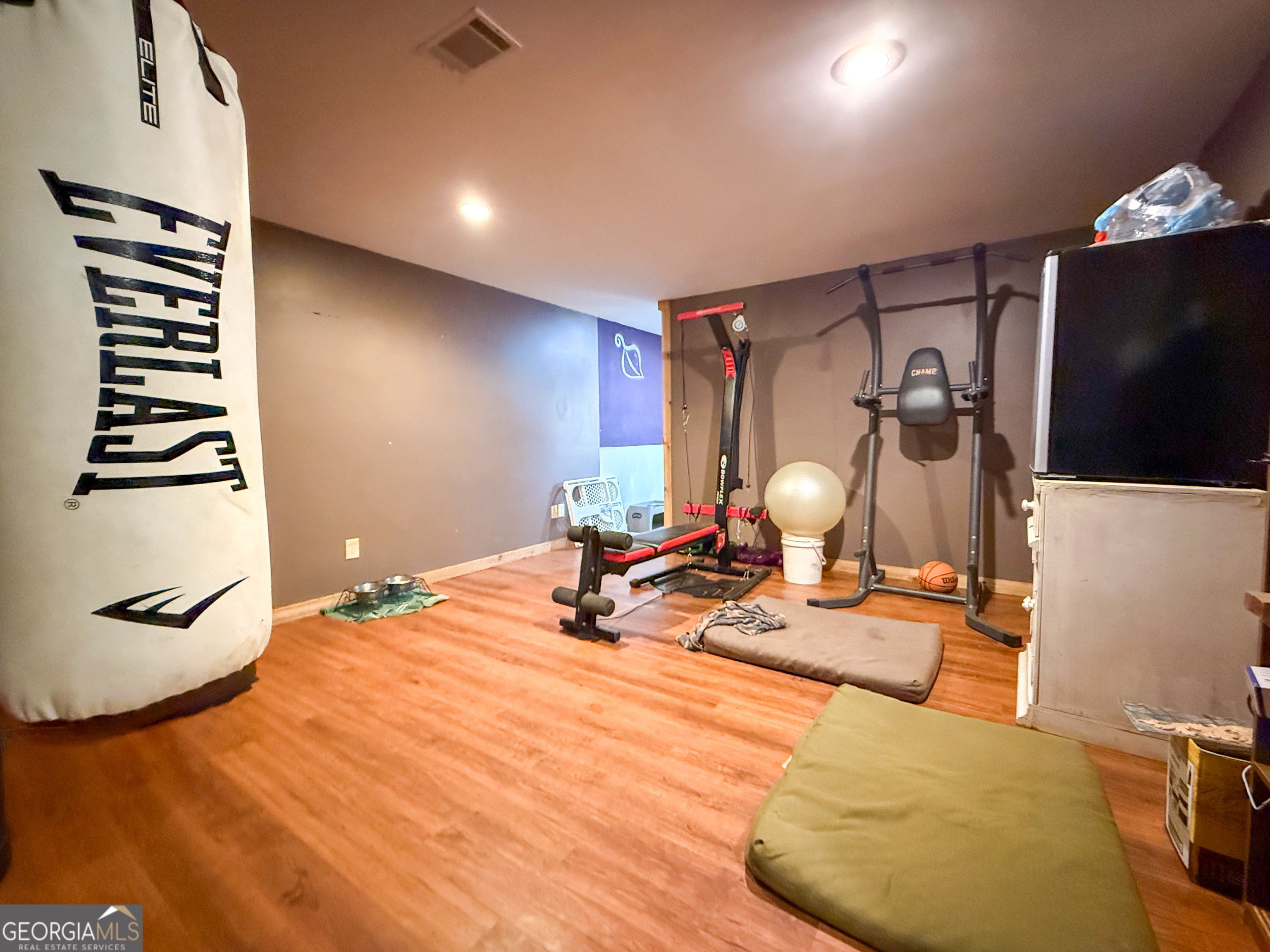 161 Twisting Ridge Trail Demorest, GA 30535 - Photo 22 of 33 a bedroom with furniture and wooden floor