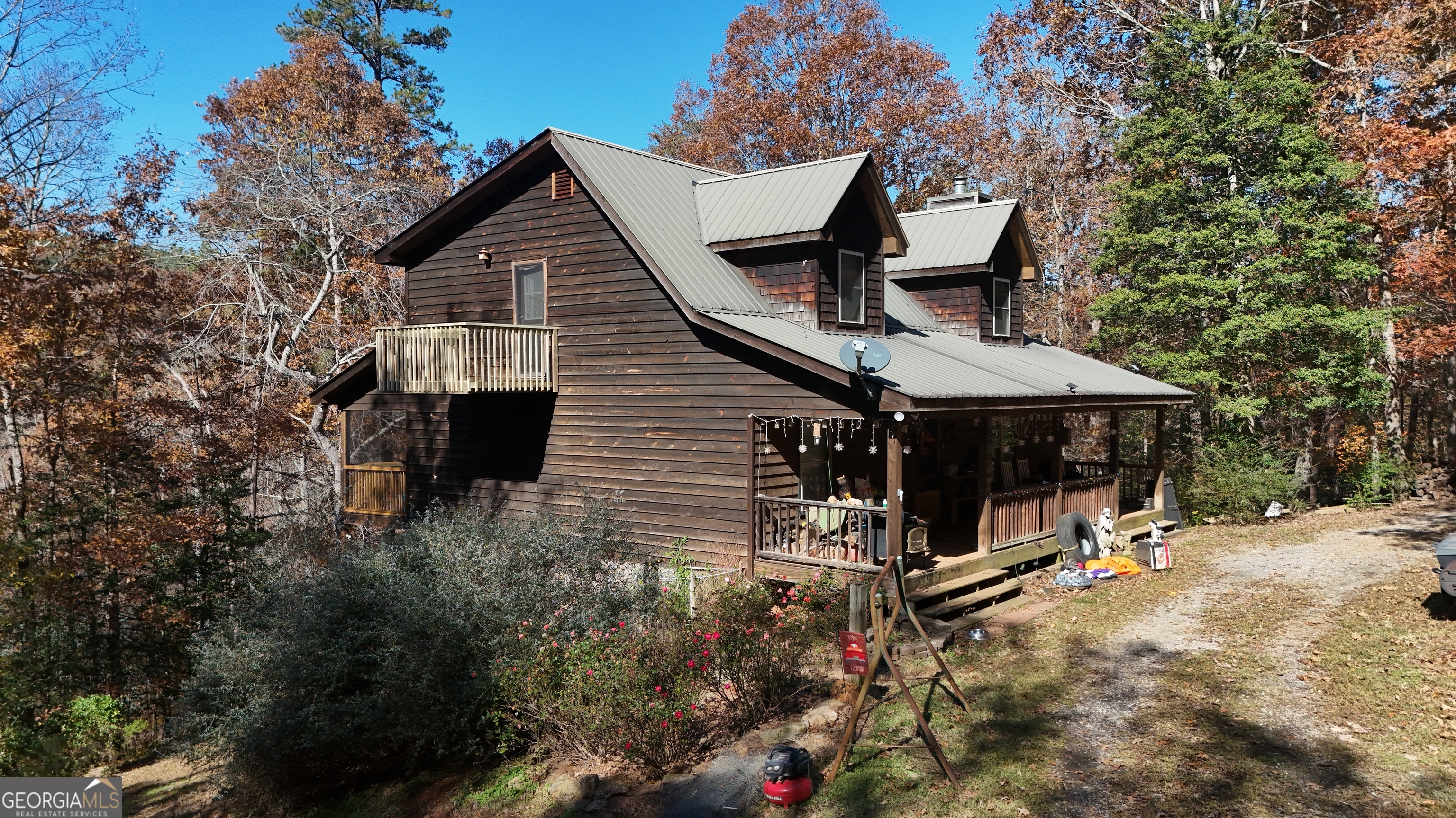 161 Twisting Ridge Trail Demorest, GA 30535 - Photo 31 of 33 a view of a house with backyard and sitting area