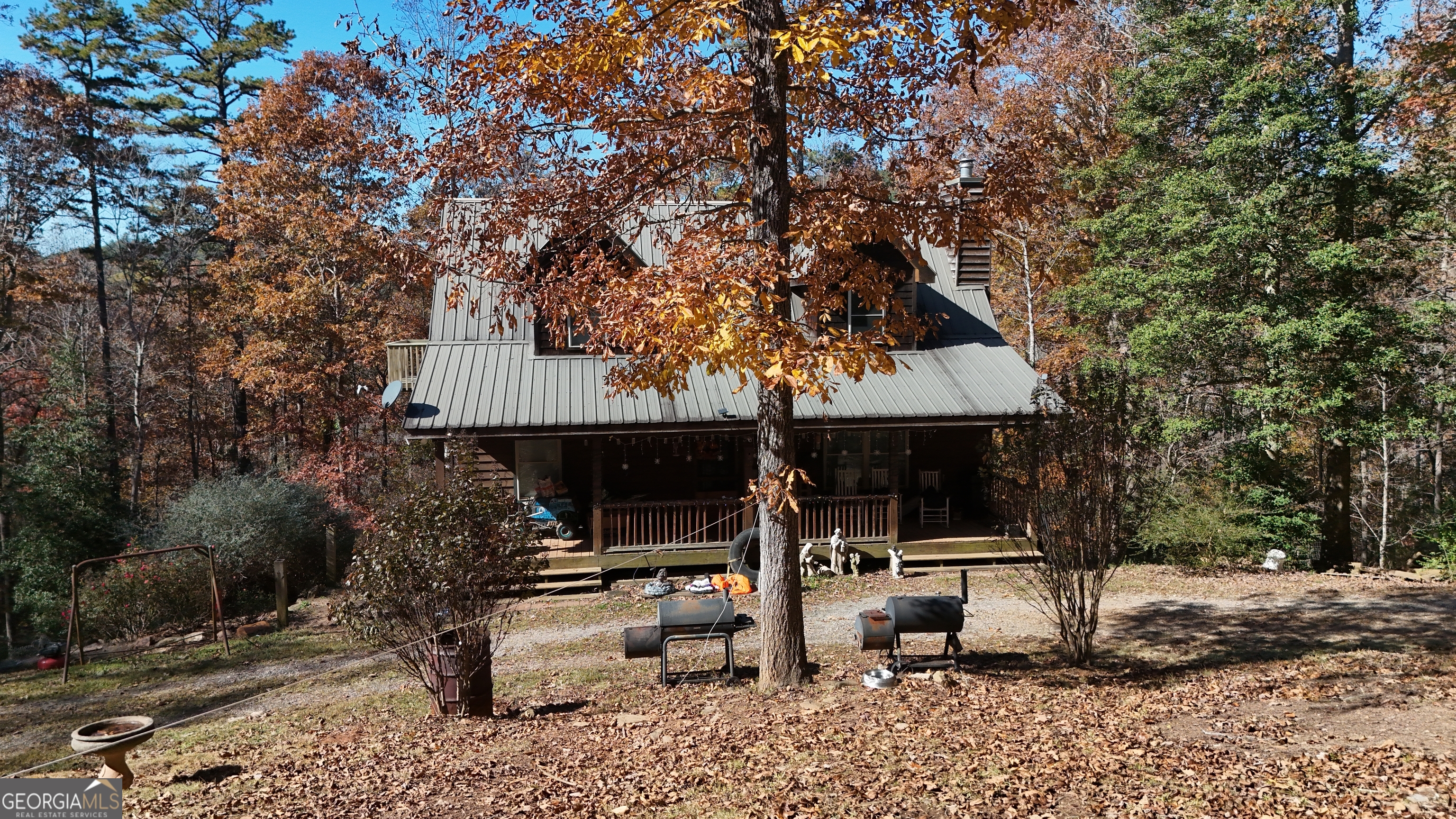 161 Twisting Ridge Trail Demorest, GA 30535 - Photo 32 of 33 a view of house with patio furniture and potted plants