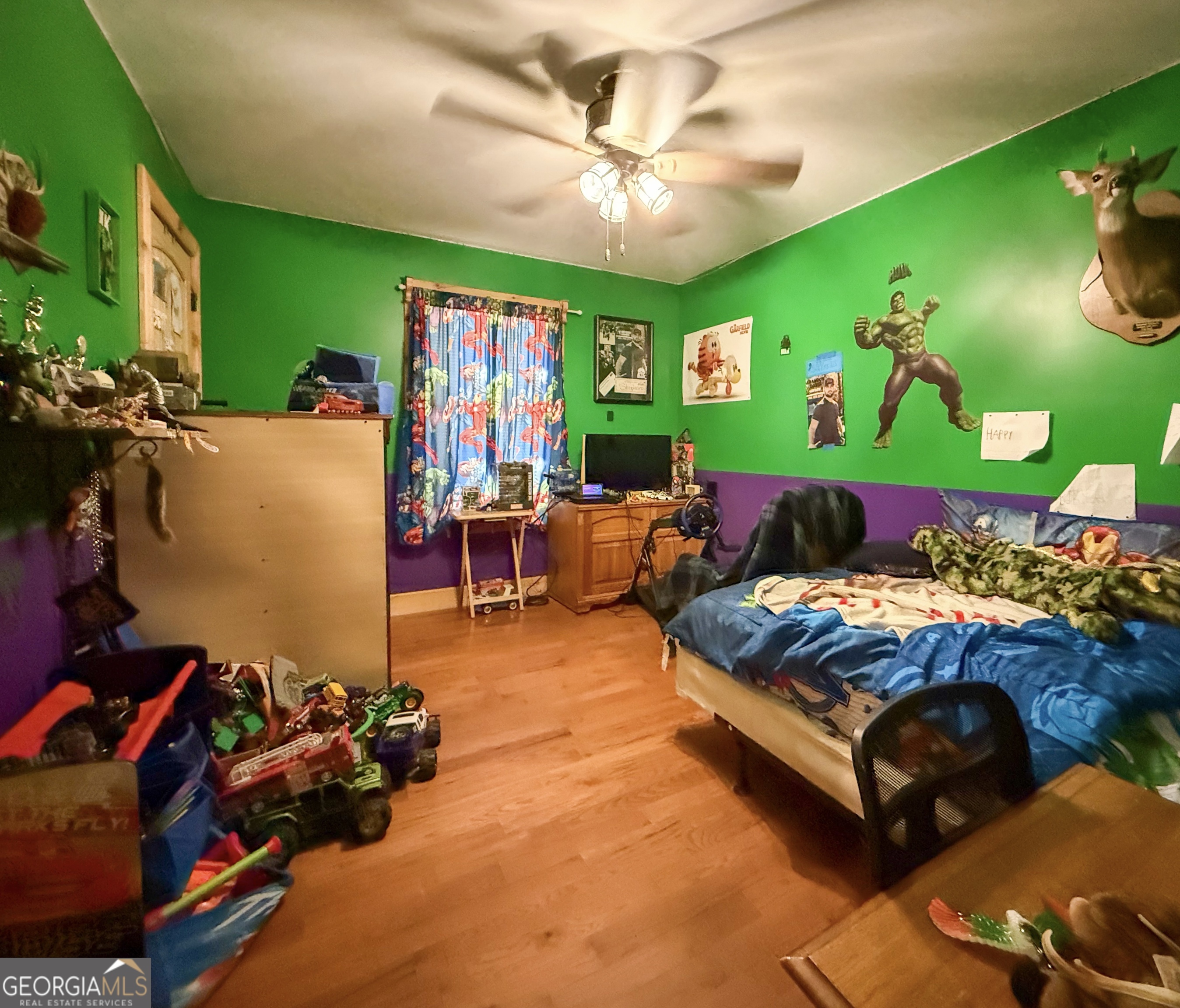 161 Twisting Ridge Trail Demorest, GA 30535 - Photo 10 of 33 a bed room with furniture and a flat screen tv