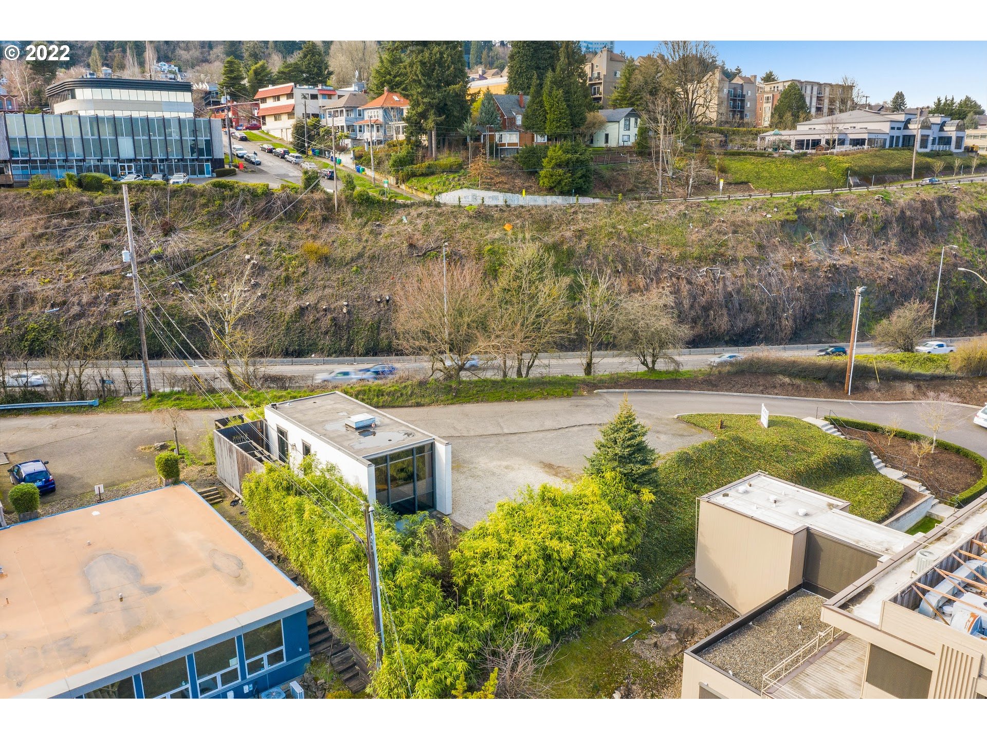4530 South Kelly Avenue Portland, OR 97239 - Photo 5 of 30 an aerial view of a house with a swimming pool