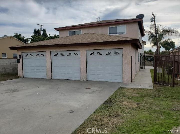 a front view of a house with a garage