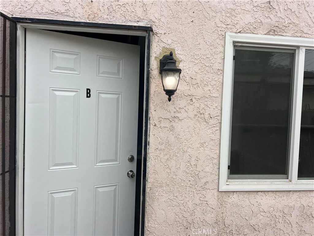 136 West 53rd Street, Unit A Long Beach, CA 90805 - Photo 2 of 13 a view of a door of a house