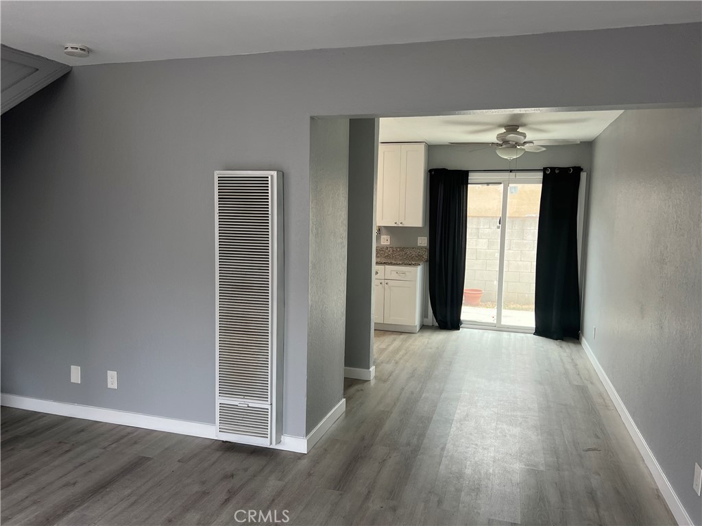136 West 53rd Street, Unit A Long Beach, CA 90805 - Photo 4 of 13 a view of a hallway with wooden floors