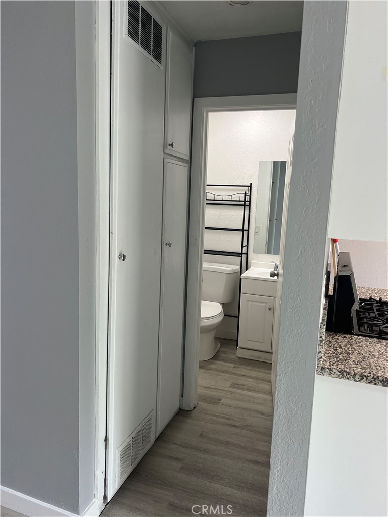 136 West 53rd Street, Unit A Long Beach, CA 90805 - Photo 7 of 13 a bathroom with a sink and a toilet