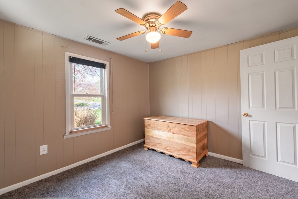 9340 Old Highway 76 Morganton, GA 30560 - Photo 16 of 19 an empty room with windows and fan