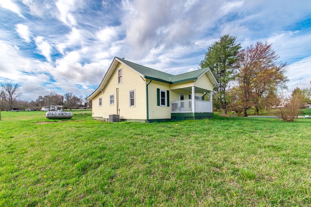 9340 Old Highway 76 Morganton, GA 30560 - Photo 3 of 19 a view of a house with backyard and garden
