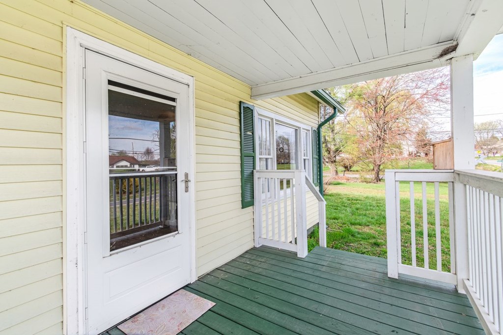 9340 Old Highway 76 Morganton, GA 30560 - Photo 6 of 19 a view of a porch with wooden floor and outdoor space