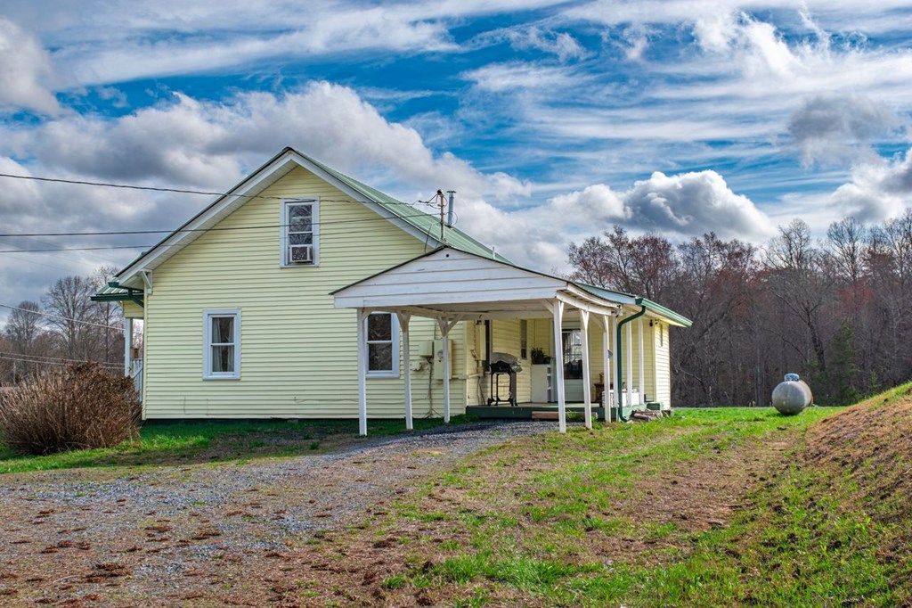 9340 Old Highway 76 Morganton, GA 30560 - Photo 7 of 19 a view of a house with backyard
