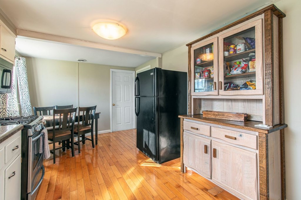 9340 Old Highway 76 Morganton, GA 30560 - Photo 10 of 19 a kitchen with stainless steel appliances granite countertop a refrigerator and a stove top oven