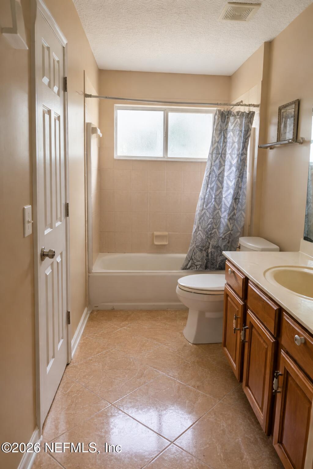 1539 Lockend Court Jacksonville, FL 32221 - Photo 12 of 24 a bathroom with a granite countertop sink toilet and shower
