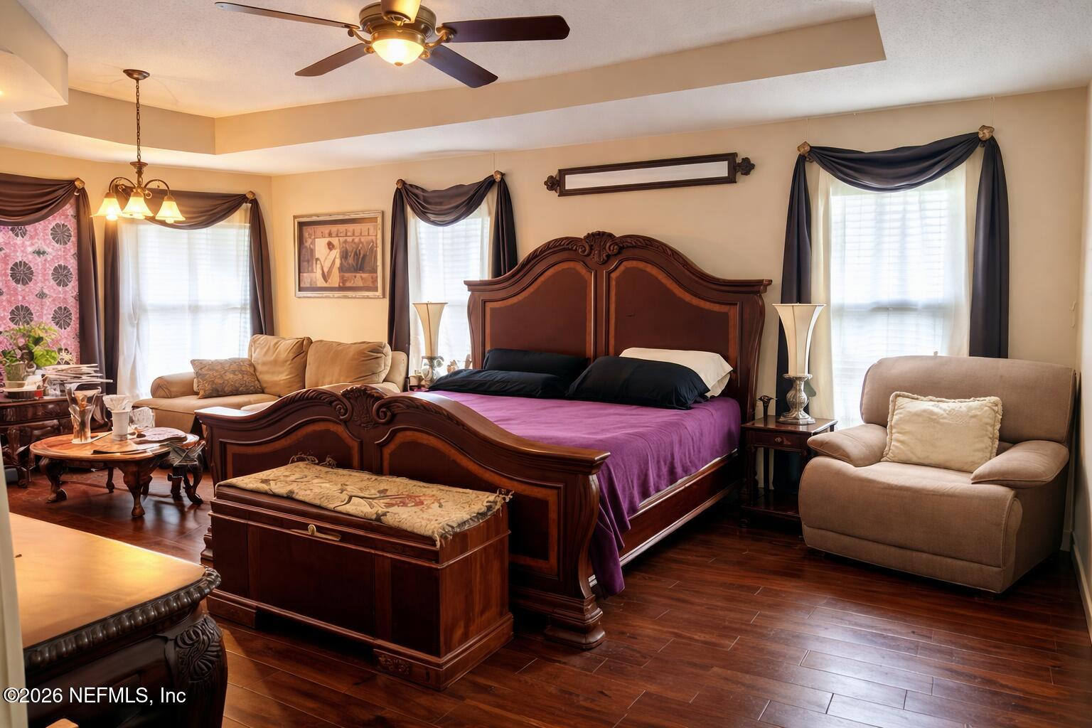1539 Lockend Court Jacksonville, FL 32221 - Photo 16 of 24 a bedroom with a bed and wooden floor