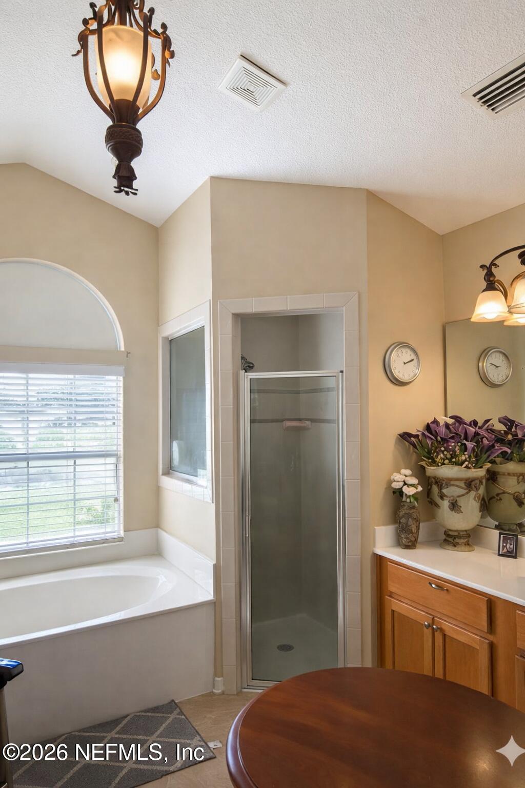 1539 Lockend Court Jacksonville, FL 32221 - Photo 20 of 24 a en suite bathroom with a sink and a mirror