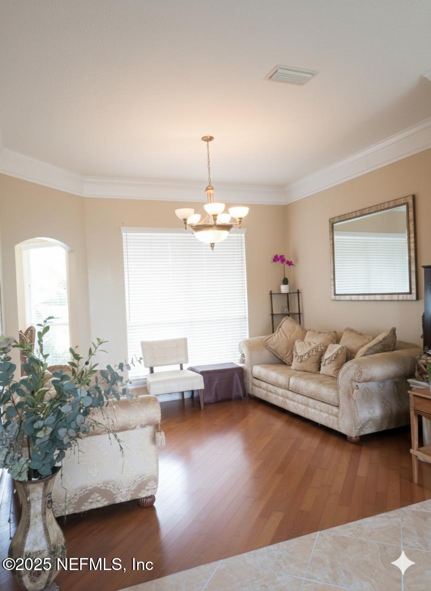 1539 Lockend Court Jacksonville, FL 32221 - Photo 6 of 23 a living room with furniture and a large window