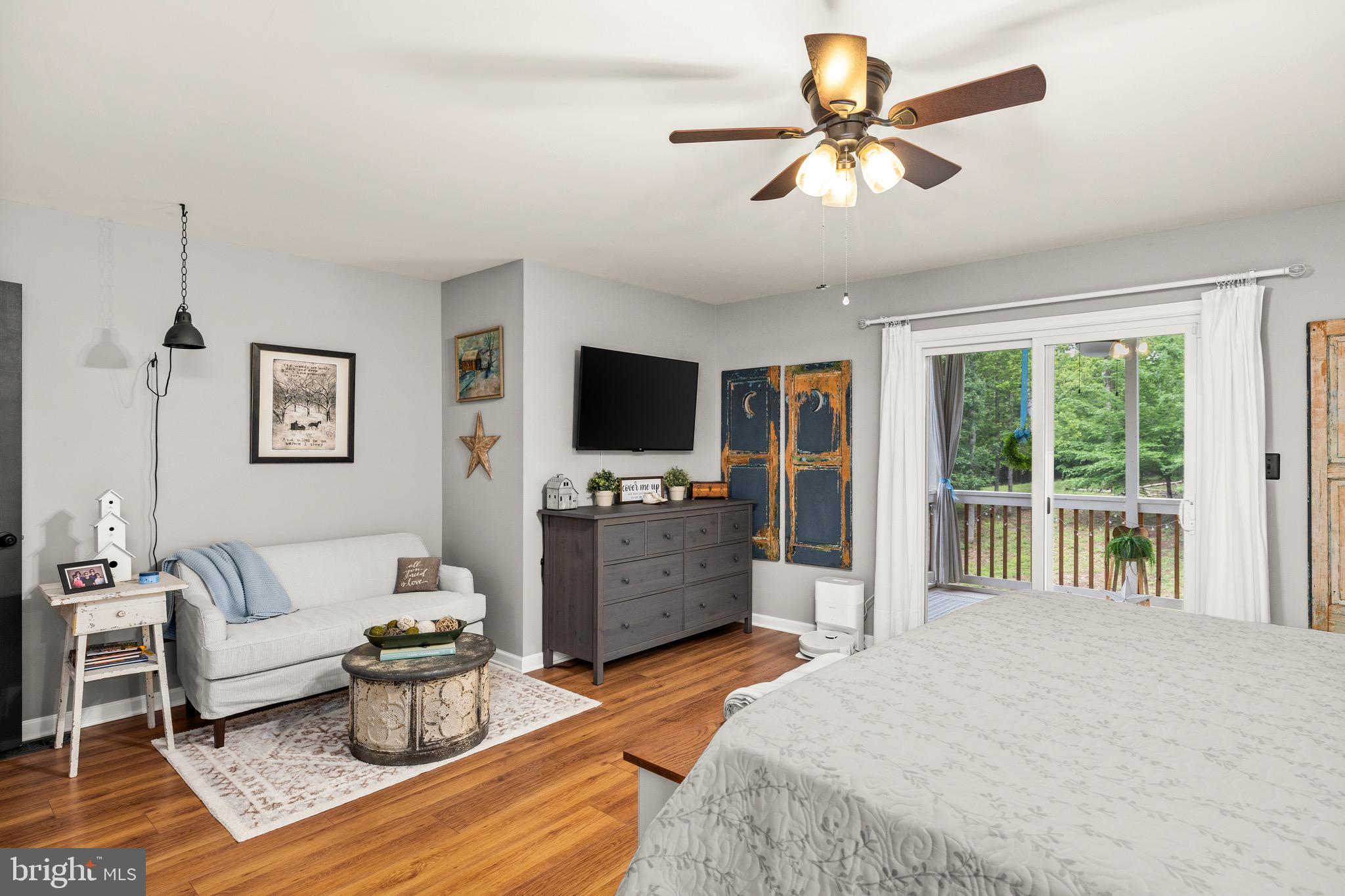 30367 Old Locust Grove Locust Grove, VA 22508 - Photo 21 of 36 a bedroom with furniture and a flat screen tv