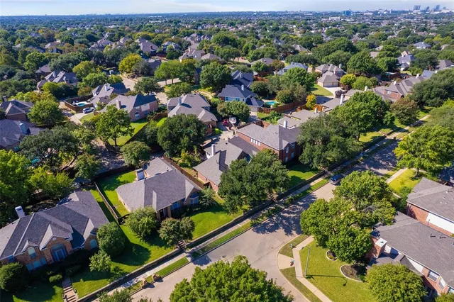 an aerial view of house with yard