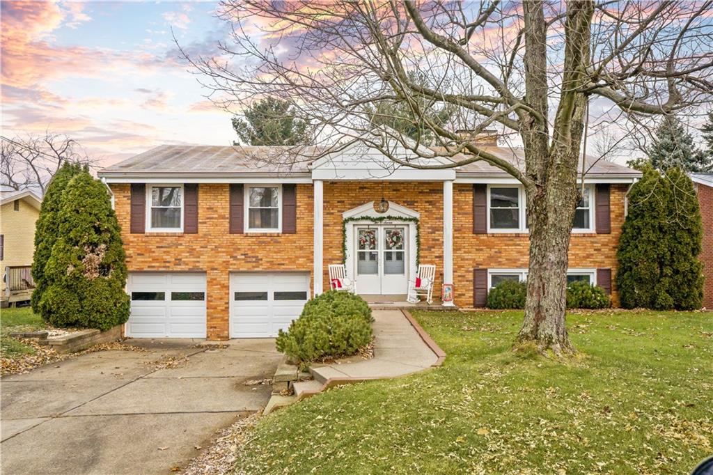 207 Lytton Road Coraopolis, PA 15108 - Photo 1 of 25 a front view of a house with a yard