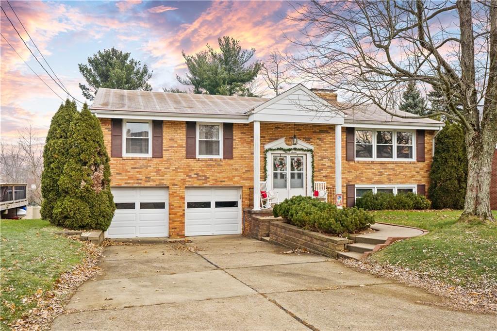 207 Lytton Road Coraopolis, PA 15108 - Photo 2 of 25 a front view of a house with garden