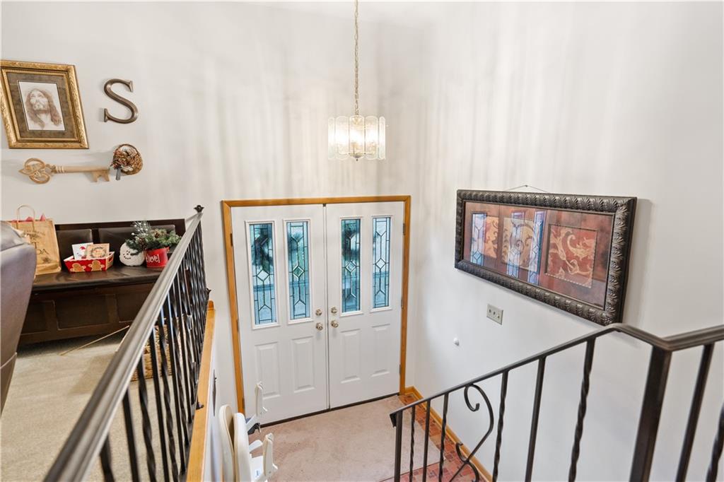 207 Lytton Road Coraopolis, PA 15108 - Photo 11 of 25 a view of a hallway with stairs and furniture