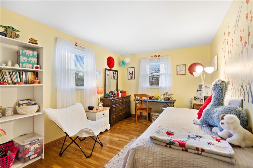 207 Lytton Road Coraopolis, PA 15108 - Photo 15 of 25 a bedroom with furniture and a book shelf