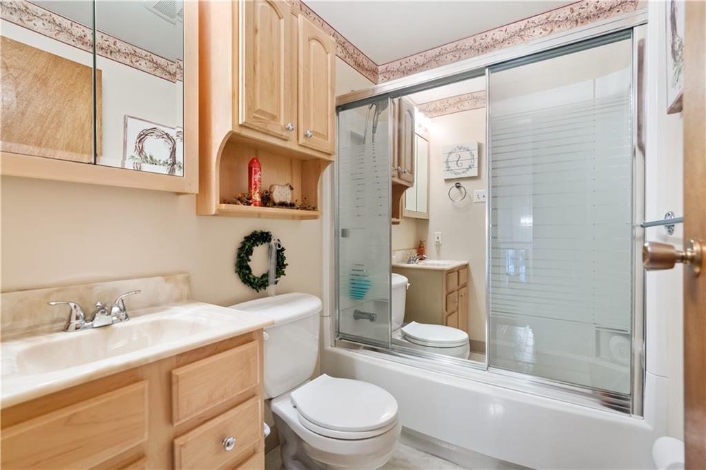 207 Lytton Road Coraopolis, PA 15108 - Photo 19 of 25 a bathroom with a sink a toilet and shower