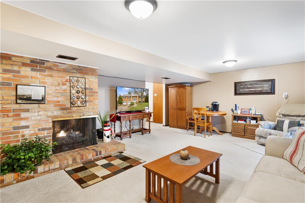 207 Lytton Road Coraopolis, PA 15108 - Photo 21 of 25 a living room with furniture fireplace and window