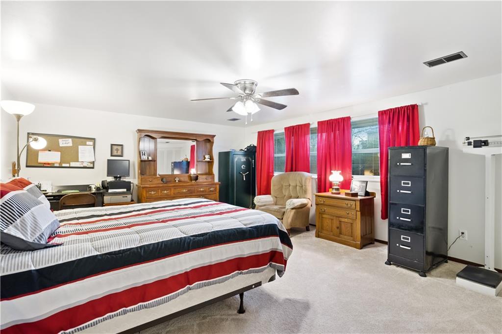 207 Lytton Road Coraopolis, PA 15108 - Photo 22 of 25 a bedroom with bed and a chandelier