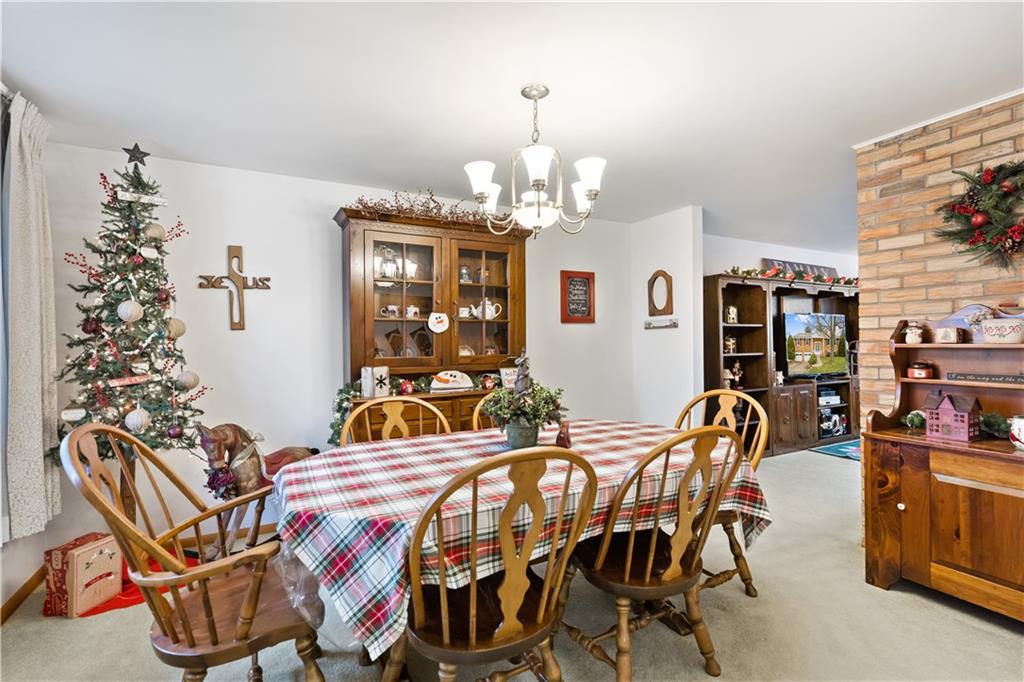 207 Lytton Road Coraopolis, PA 15108 - Photo 7 of 25 a view of a dining room with furniture and chandelier