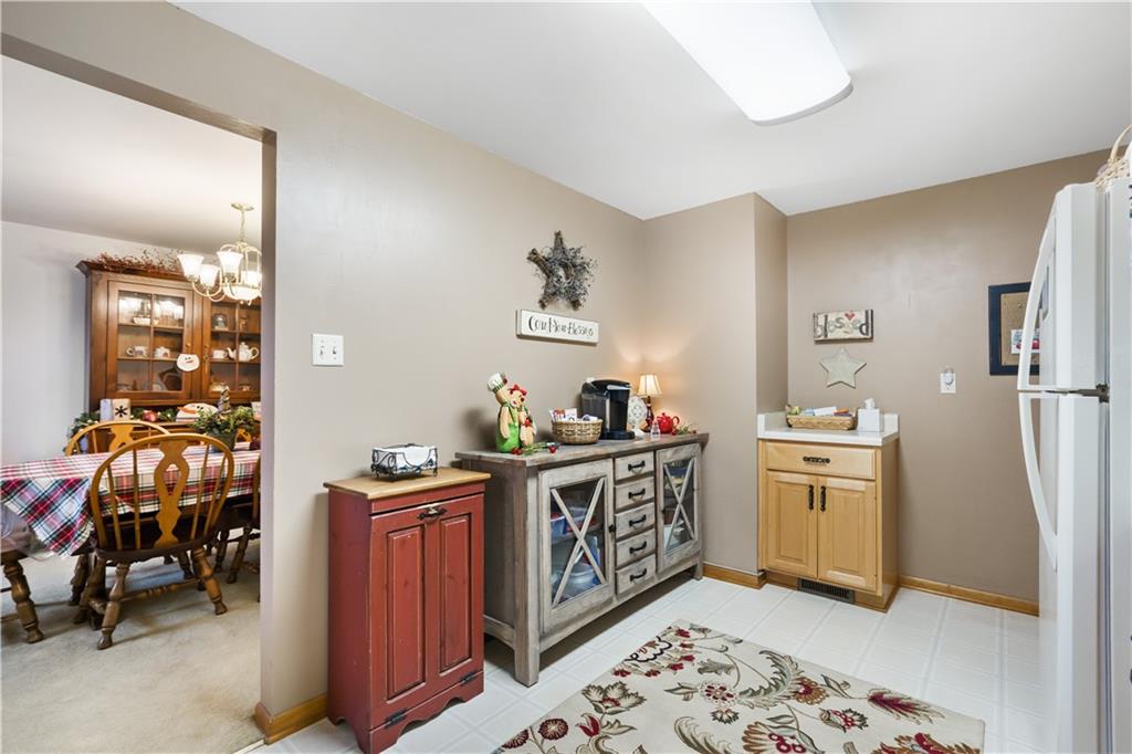 207 Lytton Road Coraopolis, PA 15108 - Photo 9 of 25 a kitchen with stainless steel appliances a stove a sink and a refrigerator