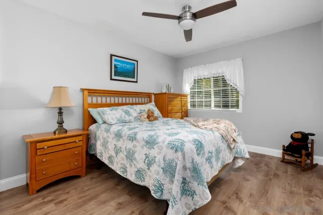 a bedroom with a bed and a closet