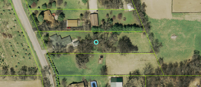 3516 Lily Pond Road Woodstock, IL 60098 - Photo 2 of 20 view of a small yard