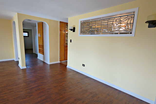3516 Lily Pond Road Woodstock, IL 60098 - Photo 13 of 20 wooden floor in an empty room