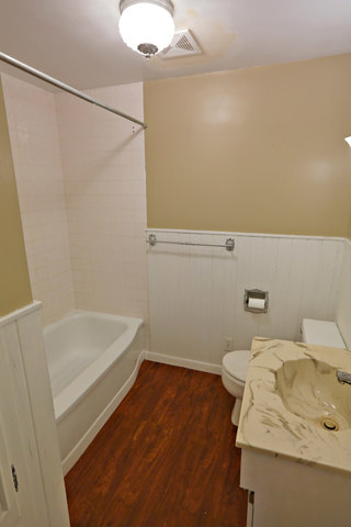 3516 Lily Pond Road Woodstock, IL 60098 - Photo 19 of 20 a bathroom with a sink and a bath tub