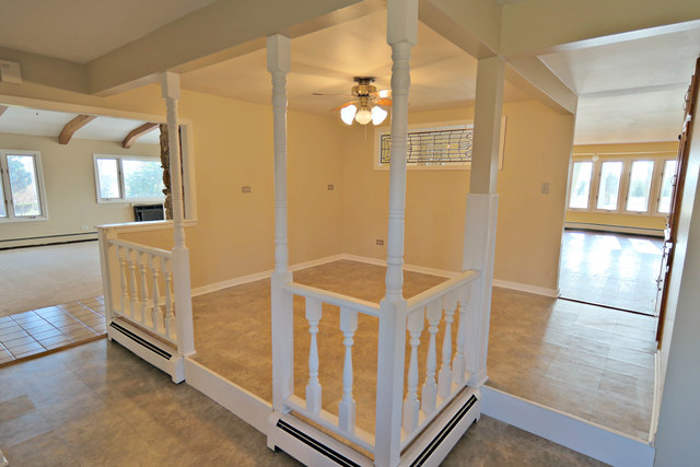 3516 Lily Pond Road Woodstock, IL 60098 - Photo 10 of 20 a view of an entryway with staircase