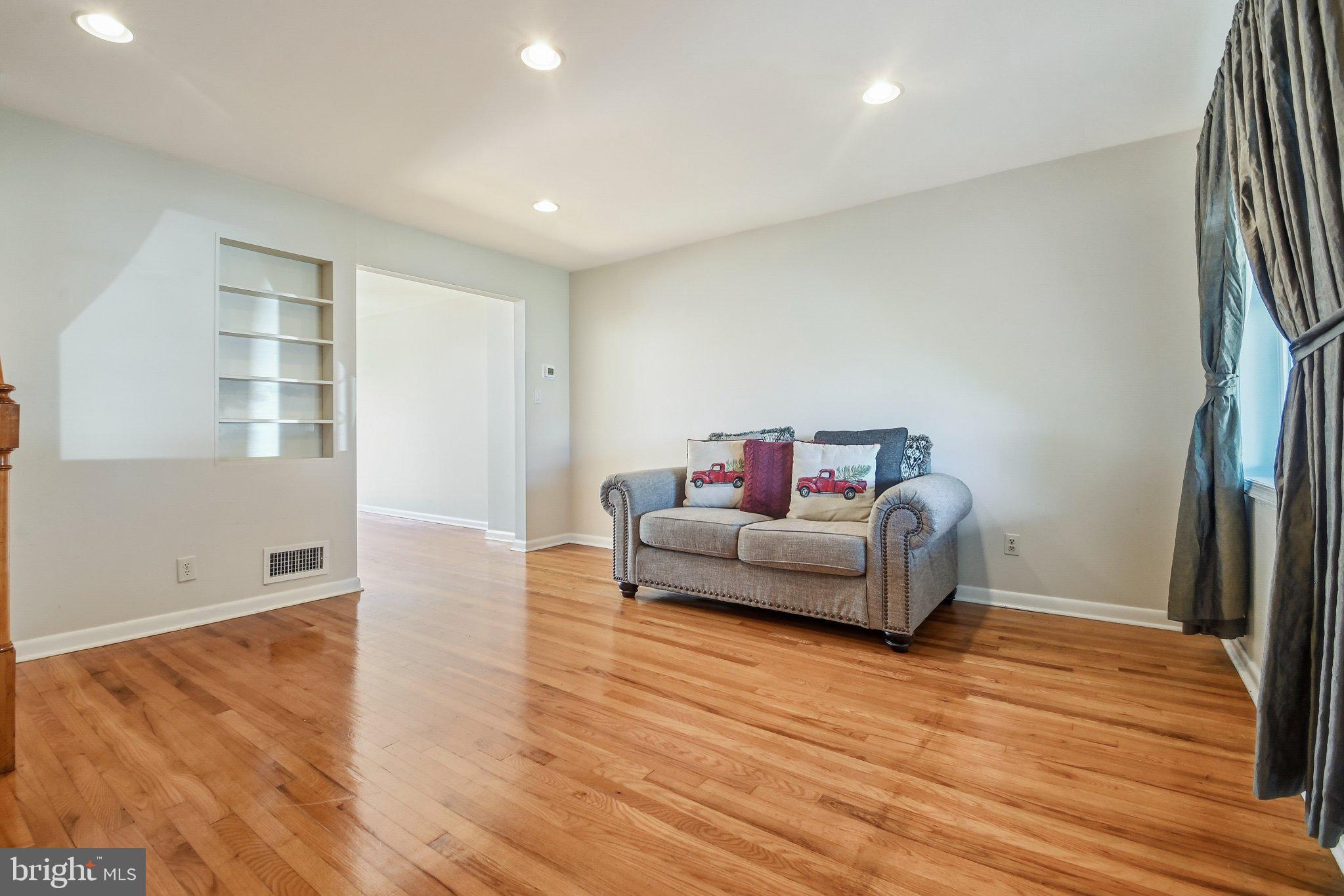 747 Old Riverside Road Baltimore, MD 21225 - Photo 4 of 26 Living Room with Hardwood Floors
