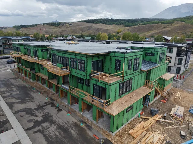 an aerial view of a house with a balcony