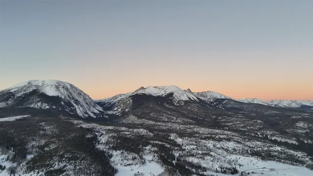 a front view of a building with glass windows