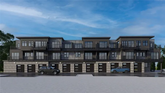 a view of a chairs and table in a room