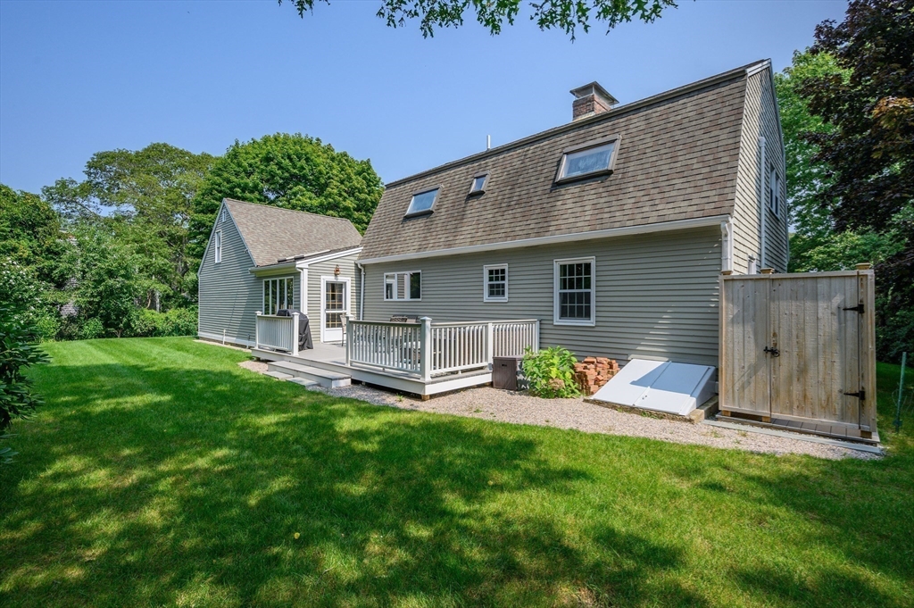 17 Cedar Point Circle Barnstable, MA 02632 - Photo 34 of 41 a view of a house with a yard porch and sitting area