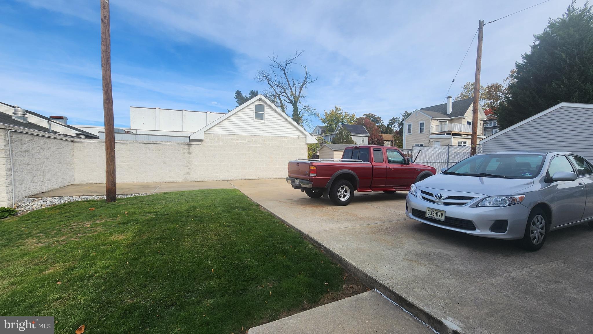 60 Pitman Avenue, Unit 60 Pitman, NJ 08071 - Photo 11 of 12 a car parked in front of a house