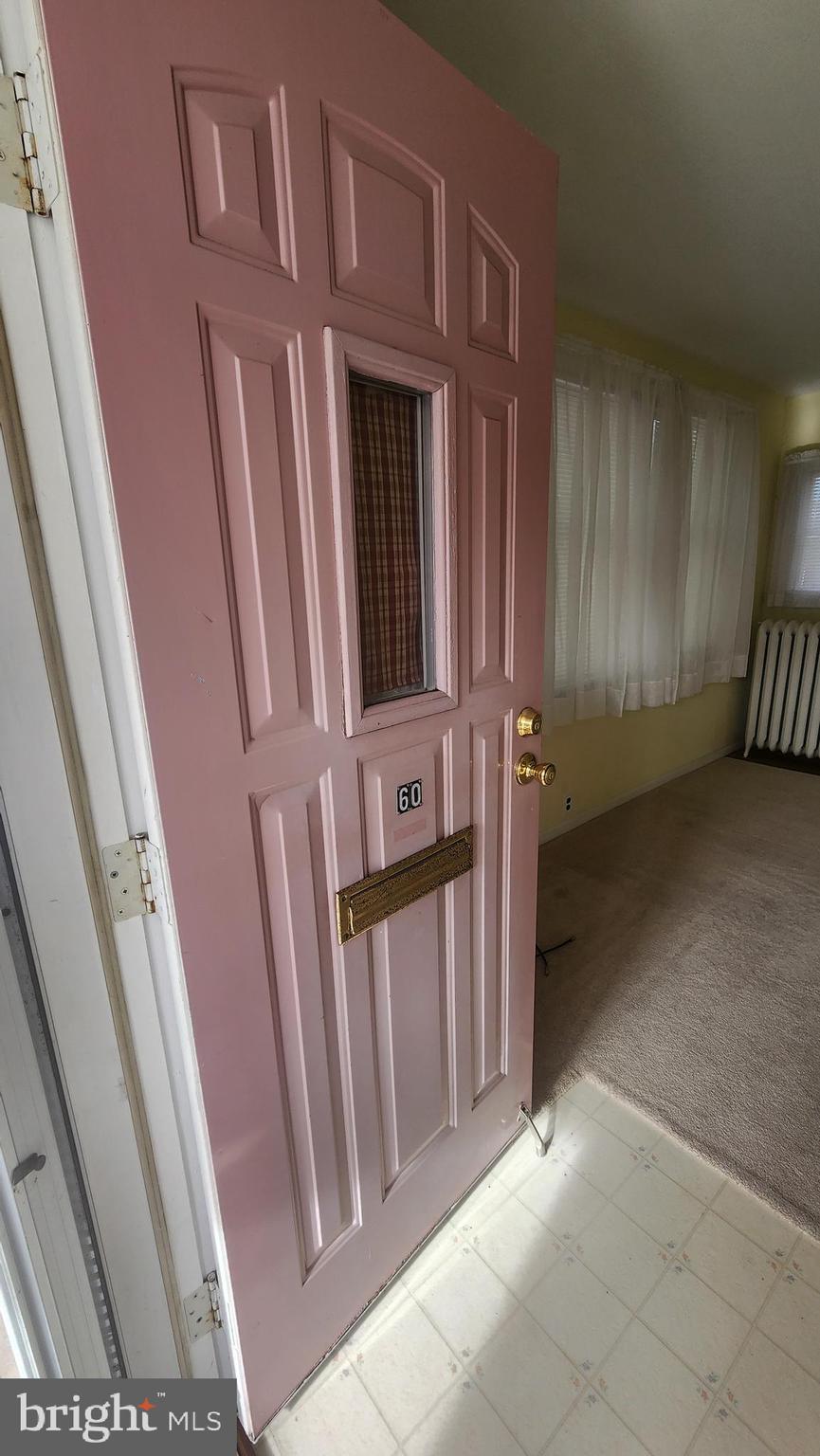 60 Pitman Avenue, Unit 60 Pitman, NJ 08071 - Photo 2 of 12 a view of an entryway door